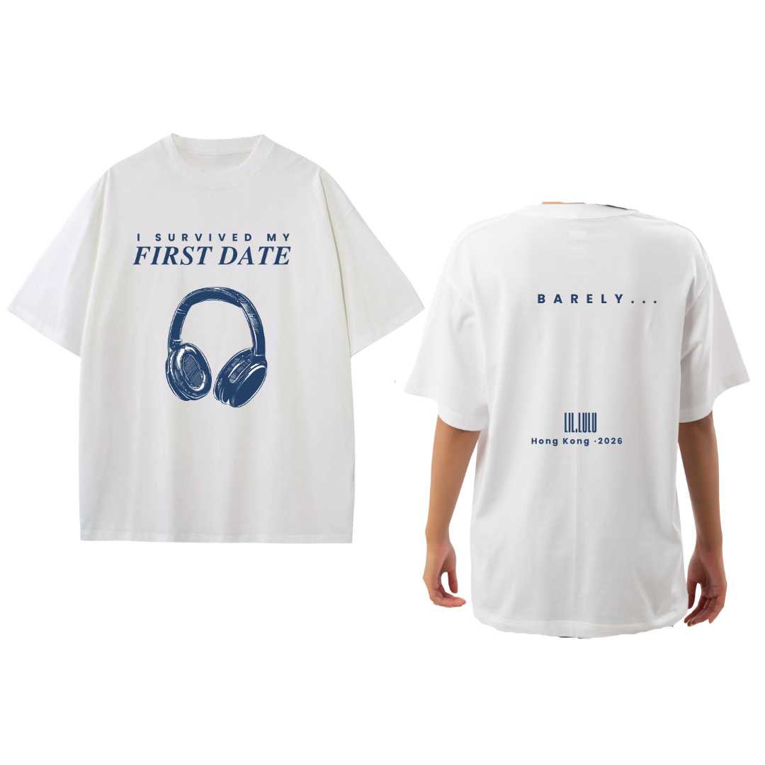 FIRST DATE Lil.Lulu 路易詩 Acoustic Live Hong Kong, 2026 - Merch Classic White short-sleeve T-shirt shown from both front and back on a white background. The front has blue text reading 'I SURVIVED MY FIRST DATE' above a blue headphone graphic.  On the back, text "Barely..." Lil.Lulu Hong Kong, 2026