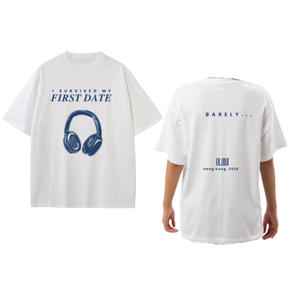 FIRST DATE Lil.Lulu 路易詩 Acoustic Live Hong Kong, 2026 - Merch Classic White short-sleeve T-shirt shown from both front and back on a white background. The front has blue text reading 'I SURVIVED MY FIRST DATE' above a blue headphone graphic.  On the back, text "Barely..." Lil.Lulu Hong Kong, 2026